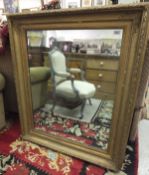 A 19th Century gilt and gesso framed rectangular wall mirror