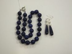 A lapis lazuli necklace, together with a similar pair of drop earrings