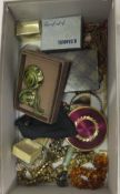 A box of assorted jewellery to include necklaces, bracelets, compact, etc