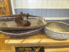 A French chestnut basket, a walnut basket, wooden trug, wooden handled trug and a wooden and iron