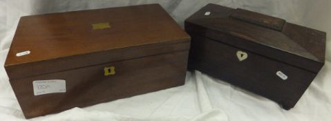 A rosewood sarcophagus shaped tea caddy and a mahogany writing slope