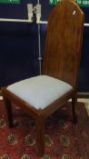 A set of six rustic hardwood high back upholstered seated chairs on square supports