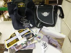 A collection of Morgan Motors memorabilia, to include calendars, bags, brochures, etc and a 75 years