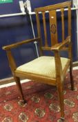 A set of eight Edwardian mahogany and inlaid dining chairs (6 plus 2 carvers)