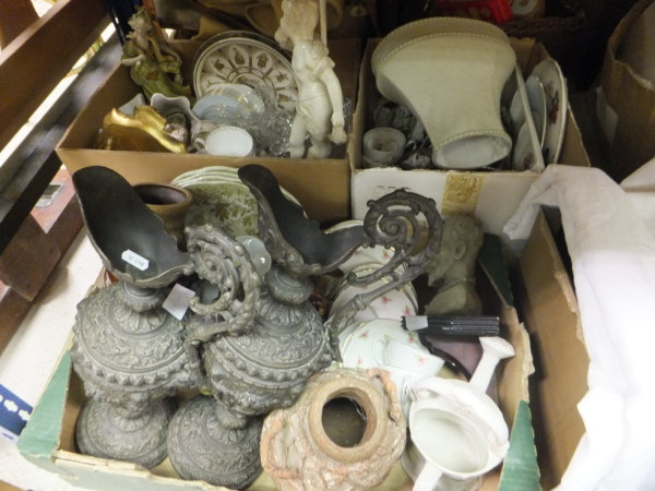 Three boxes of assorted china wares to include various plates, together with a pair of cast metal