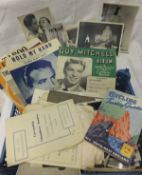 A box containing various mid 20th Century publicity photos and music scores