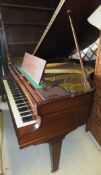 A mahogany cased Norbeck baby grand piano