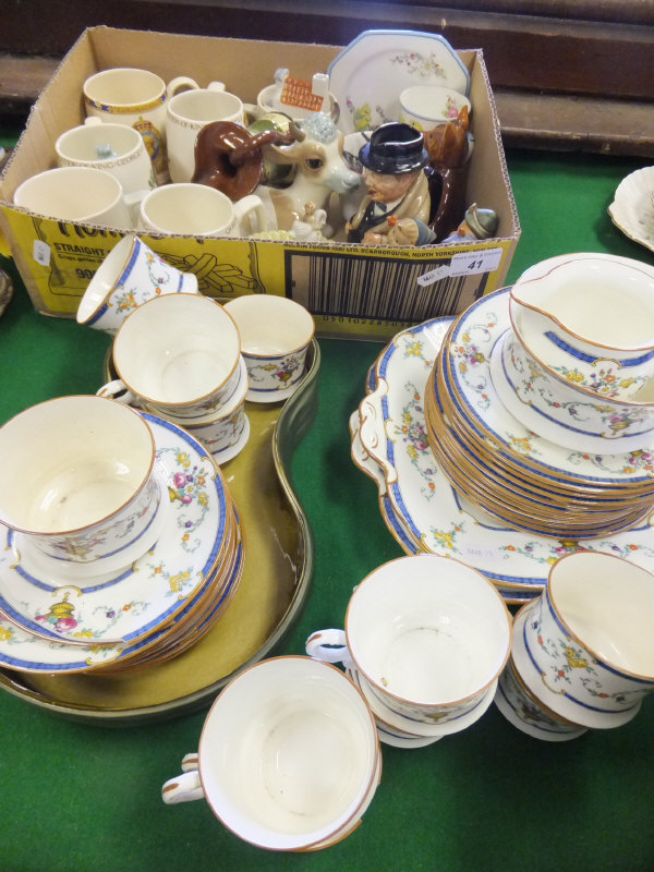 A collection of miscellaneous china wares to include Coronation mugs, a Royal Doulton character