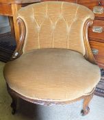 A Victorian walnut buttoned back salon chair raised on acanthus carved cabriole front legs,