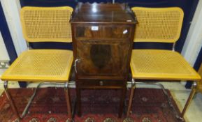 A mahogany bedside cabinet with shaped galleried top and single door cupboard with door below, on