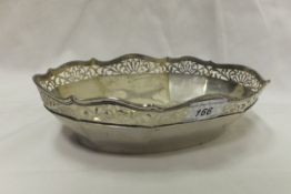 A Continental white metal pierced bowl of oval form, stamped "800 Buchler"