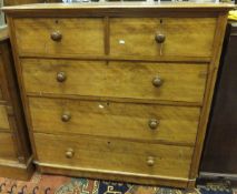 A Victorian mahogany chest of two short and three long drawers with turned handles   CONDITION