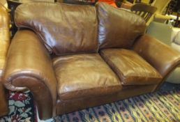 A Laura Ashley brown leather scroll arm sofa   CONDITION REPORTS  Size approx. 203 cm wide, 93 cm