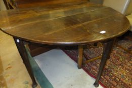 A 19th Century elm drop-leaf gate-leg dining table with single end drawer