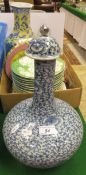 A late 19th / early 20th Century Chinese porcelain blue and white bottle shaped jar and cover,