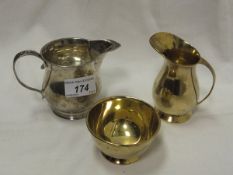 A mid 20th Century silver gilt milk jug and sugar bowl (by Charles S Green & Co. Ltd, Birmingham,