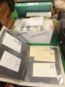 A box of various First Day Covers