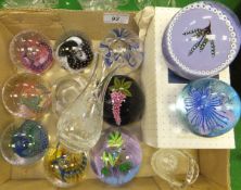 Assorted Caithness glass paperweights, a clear glass vase, clear glass basket by Tom Bohemia and a