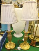 A pair of 20th Century gilt brass table lamps with acanthus and reeded decoration in the Louis XVI