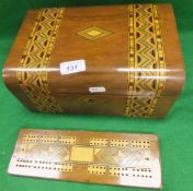 A marquetry inlaid box and similar cribbage board