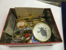 A box of assorted jewellery to include brooches, necklaces, etc   CONDITION REPORTS  Watches with