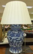 A modern Chinese baluster shaped vase and cover as a table lamp   CONDITION REPORTS  Height of table