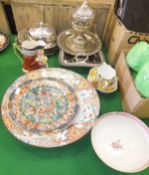 An Oriental bowl decorated with assorted figures, two Oriental plates, Toby jug, twin-handled cup