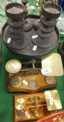 Two sets of brass postal scales, a pair of cast metal candlesticks by "Robert Welch", matching tazza