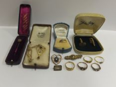 A collection of gold jewellery to include 9 carat gold rings, 22 carat gold ring, a pair of 9