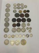 A box of assorted coinage to include a George III 1 shilling, various Queen Victoria half crowns,