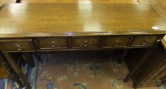 An oak rectangular slim side table with five drawers on square chamfered legs   CONDITION REPORTS