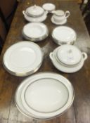 A Royal Doulton "Sarabande" H.5023 pattern part dinner service to include two lidded tureens,