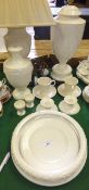 A collection of Wedgewood cream ware to include bowl, plate, dish, egg cups, candlesticks, teacups