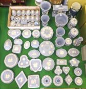 A large collection of blue and white Wedgwood Jasperware china to include pin dishes, lidded pots,