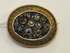 A micro-mosaic brooch depicting flowers