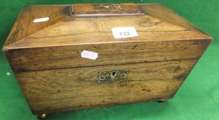 An early 19th Century rosewood and mother of pearl inlaid sarcophagus shaped two section tea caddy