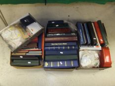 Three boxes of assorted stamp albums, loose stamps, first day covers, etc