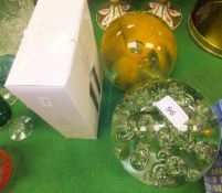 Two large glass paperweights and modern reproduction scent bottle in the Art Deco style*
