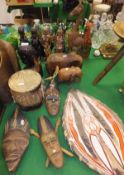 Assorted tribal items to include drum, two carved elephants, other carved figures and animals and