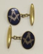 A pair of 9 carat gold Masonic cufflinks   CONDITION REPORTS  Surfaces have scratches and pitting,