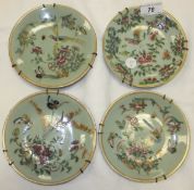 Four Chinese celadon glazed plates with hand-painted decoration featuring birds amongst foliage