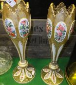 A pair of Bohemian overlaid glass vases with gilt decoration   CONDITION REPORTS  Approx 35cm high.