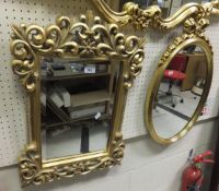 A collection of four mirrors to include a 19th Century rectangular mahogany framed toilet mirror, an