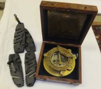 A reproduction brass sundial compass, the label inscribed "J. H Stewart Limited Strand London",