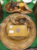 A collection of treen ware to include carved plate, oak box, candlesticks, and other assorted