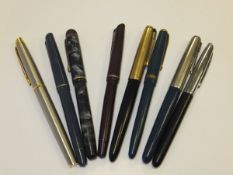 A collection of various fountain pens to include an Osmeroid 75 blue and burgundy, Conway 106