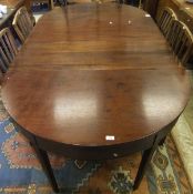 A Regency D-end dining table with two extra leaves, raised on square tapered legs   CONDITION