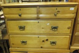 A North Country pine chest of two short over two long drawers