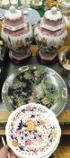 A large 20th Century Chinese porcelain charger in the famille-vert palette depicting mythical