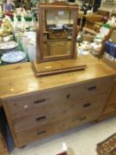 A 19th Century pitch pine chest of three long graduated drawers and a modern pine framed dressing
